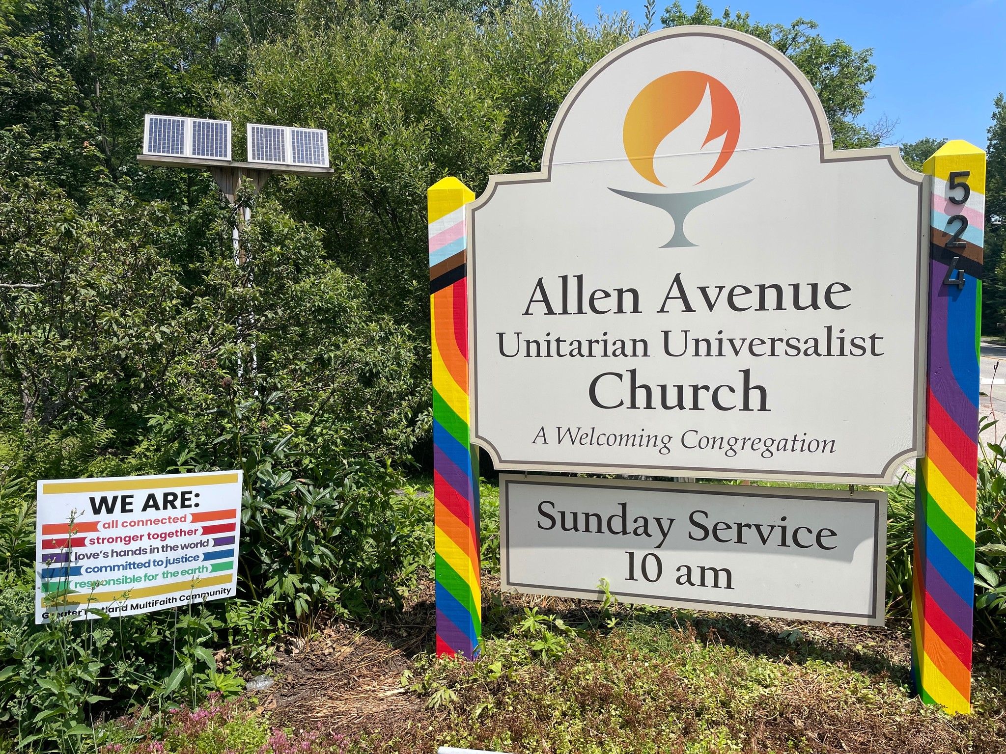 The A2U2 sign on Allen Avenue, painted with the progressive pride flag